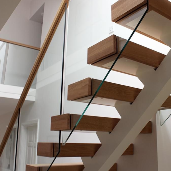 Tempered glass railing with side-mounted standoffs