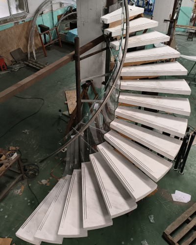 Numbered staircase components packed in plywood crates for overseas shipping