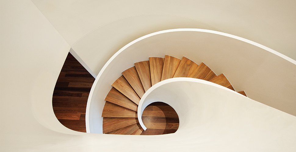 Custom wood floating staircase in a luxury villa project