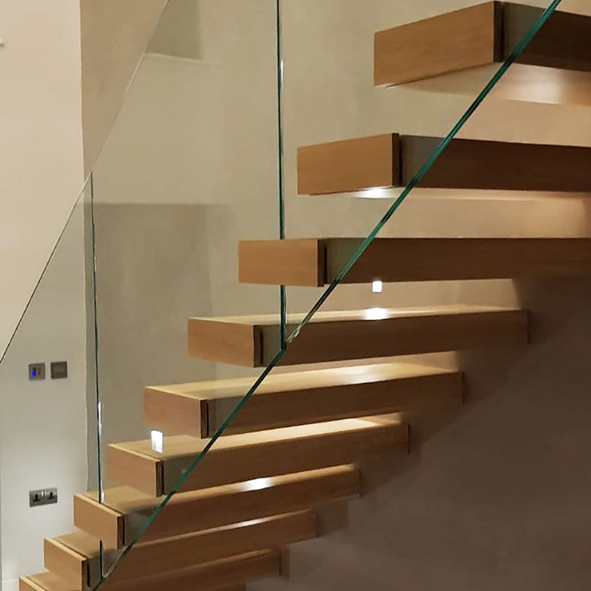 Wood floating staircase with oak treads and steel stringer